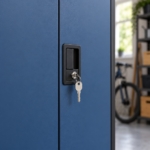 Close-up of the locking handle and key on the steel cabinet doors