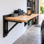 The folding workbench seen from the side showing a support bracket