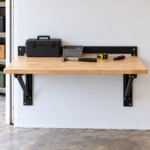 Front view of the wall-mounted folding workbench